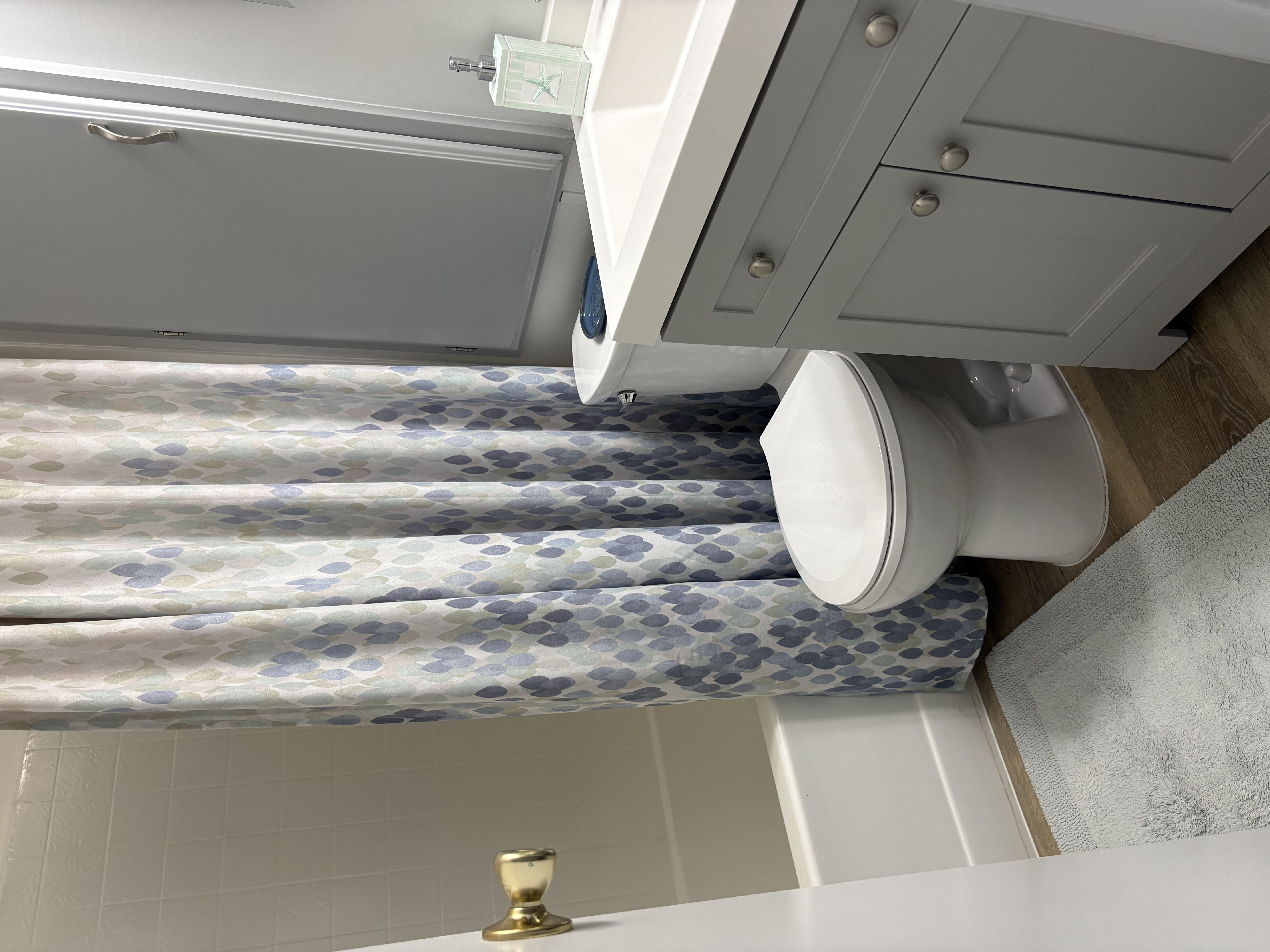 Bathroom with tub, shower, sink, and toilet